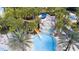 Aerial view of resort pool with waterslide and spa at 7530 Oak Spring Ln, Davenport, FL 33837