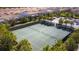 Aerial view of two well-maintained tennis courts at 7530 Oak Spring Ln, Davenport, FL 33837