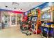 Game room featuring Guitar Hero and other games at 7783 Westland Dr, Kissimmee, FL 34747