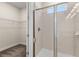 Clean bathroom with a walk-in shower and closet at 7783 Westland Dr, Kissimmee, FL 34747