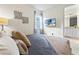 Bedroom with king-size bed and ensuite bathroom at 7783 Westland Dr, Kissimmee, FL 34747