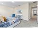 Bedroom with TV, dresser, and a comfortable bed at 7783 Westland Dr, Kissimmee, FL 34747