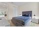 Guest bedroom with a double bed and access to the main living area at 7783 Westland Dr, Kissimmee, FL 34747
