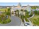 Resort-style community center with palm trees and ample parking at 7783 Westland Dr, Kissimmee, FL 34747