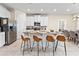 Modern kitchen with stainless steel appliances and an island with seating at 7783 Westland Dr, Kissimmee, FL 34747