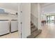 Convenient laundry room with washer, dryer, and storage at 7783 Westland Dr, Kissimmee, FL 34747