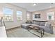 Bright living room with sectional sofa and coffee table at 7783 Westland Dr, Kissimmee, FL 34747