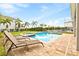 Relaxing pool area with lounge chairs and spa at 7783 Westland Dr, Kissimmee, FL 34747