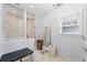 Elegant bathroom featuring a tiled shower, vanity and a window at 810 E Central Blvd, Orlando, FL 32801