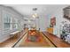 Bright dining room featuring a modern light fixture and an area rug at 810 E Central Blvd, Orlando, FL 32801