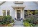 Close-up showcasing the home's front door and covered porch at 810 E Central Blvd, Orlando, FL 32801