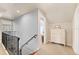 Upstairs hallway with neutral walls, carpeting, and built-in storage at 810 E Central Blvd, Orlando, FL 32801