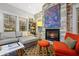 Relaxing living room with sectional sofa, fireplace, and decorative rug at 810 E Central Blvd, Orlando, FL 32801