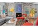Living room features a fireplace, hardwood floors, and stylish decor at 810 E Central Blvd, Orlando, FL 32801
