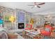 Bright living room features a fireplace, comfy seating, and an open floor plan at 810 E Central Blvd, Orlando, FL 32801