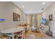 Bright living room with comfy seating and a large TV at 810 E Central Blvd, Orlando, FL 32801