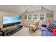 Relaxing media room with large TV and comfortable seating at 810 E Central Blvd, Orlando, FL 32801