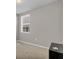 Simple bedroom with window and neutral decor at 841 Teton St, Haines City, FL 33844