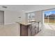 Kitchen island with granite countertop, double sink, and dishwasher at 841 Teton St, Haines City, FL 33844