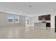 Spacious living area with open concept kitchen and breakfast bar at 841 Teton St, Haines City, FL 33844