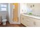 Bathroom with shower, double vanity, and granite countertop at 8923 Shine Dr, Kissimmee, FL 34747
