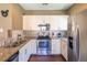 Kitchen with granite countertops and stainless steel appliances at 8923 Shine Dr, Kissimmee, FL 34747