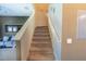 Carpeted staircase leading to the second floor at 8923 Shine Dr, Kissimmee, FL 34747