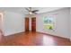 Spacious living area with hardwood floors and lots of natural light at 1006 Center St, Ocoee, FL 34761