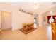 Small dining area with wooden table and chairs, near living room at 1101 James Ave, Deltona, FL 32738