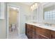 Large bathroom with double vanity and a walk-in shower at 1107 Pheasant Cir, Winter Springs, FL 32708