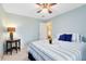 Bedroom with wood floors and blue bedding at 1107 Pheasant Cir, Winter Springs, FL 32708