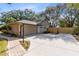 Attached garage with new concrete driveway at 1107 Pheasant Cir, Winter Springs, FL 32708