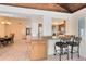 Kitchen counter with granite and two barstools at 1107 Pheasant Cir, Winter Springs, FL 32708