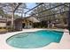 Inviting pool area with screened enclosure at 1107 Pheasant Cir, Winter Springs, FL 32708