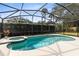 Inviting screened pool and spa with ample deck space at 1107 Pheasant Cir, Winter Springs, FL 32708