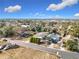 Aerial view of a home and surrounding neighborhood at 1119 Pine Ave, Tavares, FL 32778