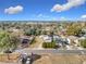 Aerial view of a residential area near a lake at 1119 Pine Ave, Tavares, FL 32778