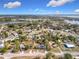 Aerial view showcasing a home and surrounding neighborhood at 1119 Pine Ave, Tavares, FL 32778