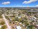 Aerial view of a residential neighborhood near a lake at 1119 Pine Ave, Tavares, FL 32778