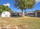 Backyard view, shed and carport at 1119 Pine Ave, Tavares, FL 32778