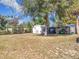 Backyard with shed and lawn at 1119 Pine Ave, Tavares, FL 32778