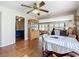 Dining area with table and chairs, offering views into the living room at 1119 Pine Ave, Tavares, FL 32778