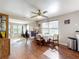 Open dining area with table and chairs near the kitchen and living room at 1119 Pine Ave, Tavares, FL 32778