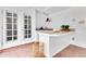 White outdoor kitchen with granite countertops, sink, and grill at 1203 Waverly Way, Longwood, FL 32750