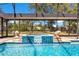 Enclosed pool and spa with tiled water feature at 1203 Waverly Way, Longwood, FL 32750