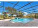 Enclosed pool with a spa and a beautiful backyard view at 1203 Waverly Way, Longwood, FL 32750