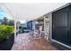 Inviting front porch with brick flooring, rocking chairs, and a 'Welcome' sign for a cozy entrance at 1222 Golfview St, Orlando, FL 32804