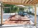 Backyard patio with pergola, seating and playset at 127 Kaywood Dr, Sanford, FL 32771