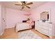 Charming bedroom with floral bedding and dresser at 127 Kaywood Dr, Sanford, FL 32771