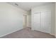 Bedroom with double door closet and carpet flooring at 1274 Shoreside St, Clermont, FL 34714